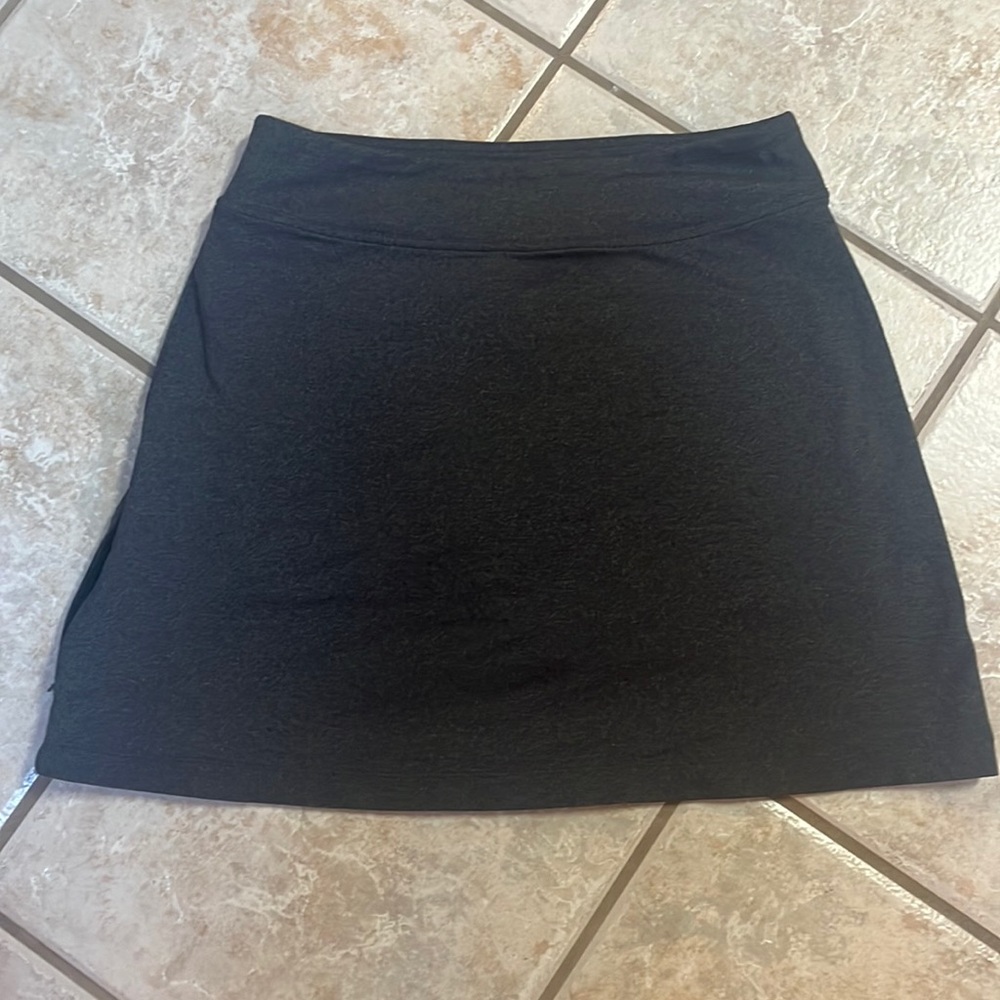 Dark grey Athleta skort with side zippered pocket